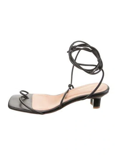 Pre-owned Loq Leather Sandals In Black