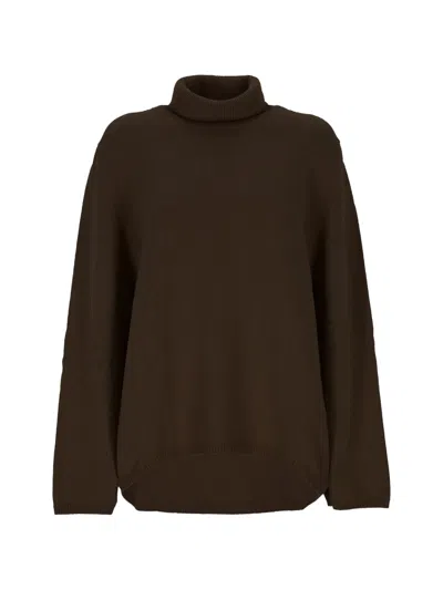 Lorena Antoniazzi Roll-neck Asymmetric-hem Knit In Brown