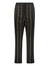 Lorena Antoniazzi Striped Peg Trousers In Black
