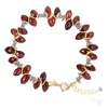 Lori Kaplan Design Women's Blue / Red / Gold Signature Marquis Garnet & Tanzanite Gold Bracelet