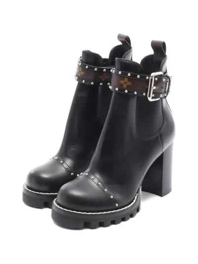 Pre-owned Louis Vuitton 10s Trail Line Studded Boots In Black