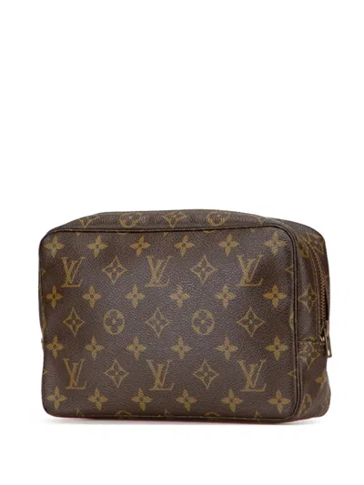 Pre-owned Louis Vuitton 1982 Monogram Trousse Toilette 23 Clutch Bag In Brown