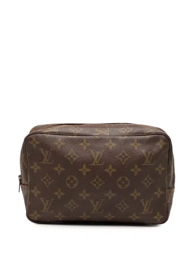 Pre-owned Louis Vuitton 1982 Monogram Trousse Toilette 23 Clutch Bag In Brown