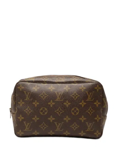 Pre-owned Louis Vuitton 1982 Monogram Trousse Toilette 23 Clutch Bag In Brown