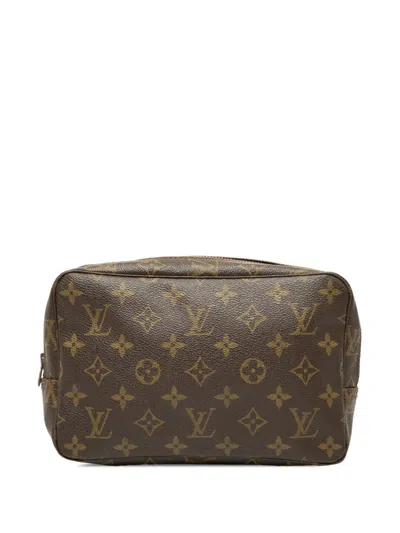 Pre-owned Louis Vuitton 1982 Monogram Trousse Toilette 23 Clutch Bag In Brown