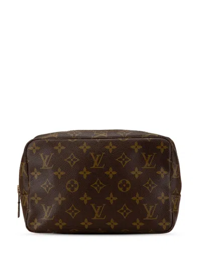 Pre-owned Louis Vuitton 1982 Monogram Trousse Toilette 23 Clutch Bag In Brown