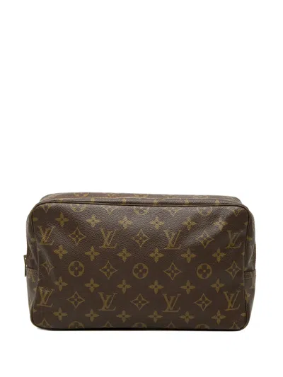 Pre-owned Louis Vuitton 1982 Monogram Trousse Toilette 28 Clutch Bag In Brown