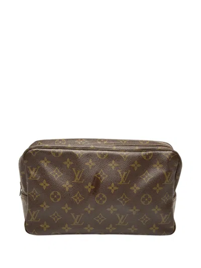 Pre-owned Louis Vuitton 1982 Monogram Trousse Toilette 28 Clutch Bag In Brown