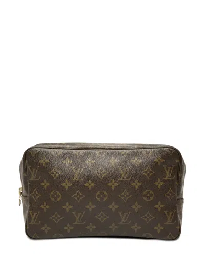 Pre-owned Louis Vuitton 1982 Monogram Trousse Toilette 28 Clutch Bag In Brown