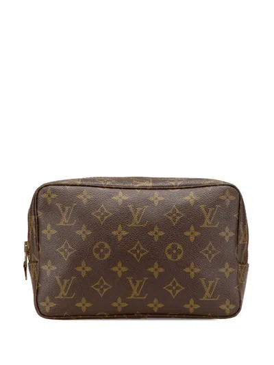 Pre-owned Louis Vuitton 1983 Monogram Trousse Toilette 23 Clutch Bag In Brown