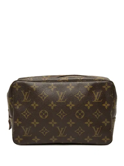 Pre-owned Louis Vuitton 1983 Monogram Trousse Toilette 23 Clutch Bag In Brown