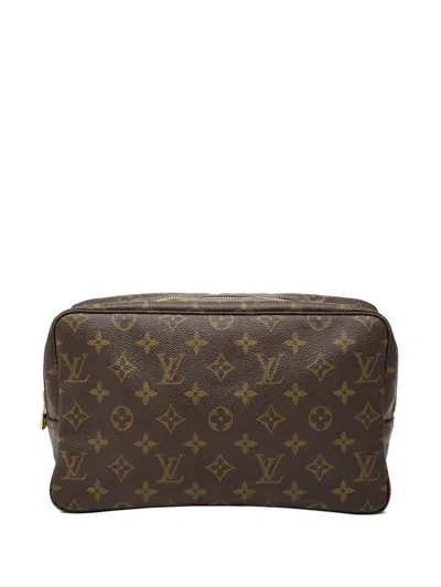 Pre-owned Louis Vuitton 1983 Monogram Trousse Toilette 28 Clutch Bag In Brown
