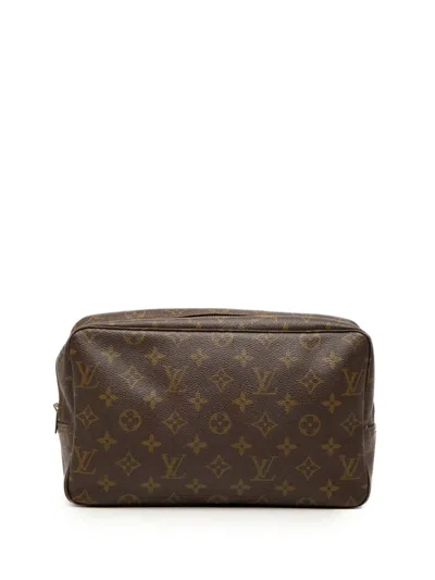 Pre-owned Louis Vuitton 1983 Monogram Trousse Toilette 28 Clutch Bag In Brown