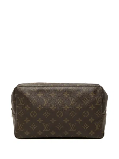 Pre-owned Louis Vuitton 1983 Monogram Trousse Toilette 28 Clutch Bag In Brown