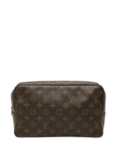 Pre-owned Louis Vuitton 1983 Monogram Trousse Toilette 28 Clutch Bag In Brown