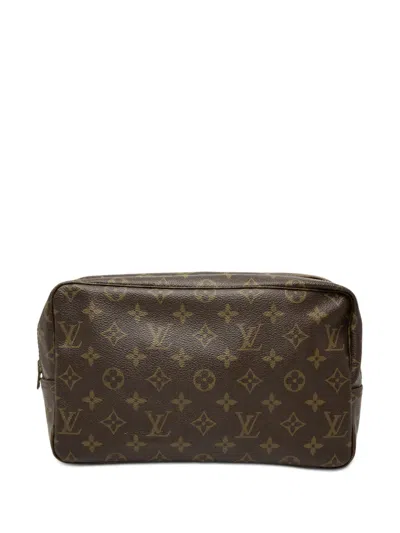 Pre-owned Louis Vuitton 1984 Monogram Trousse Toilette 28 Clutch Bag In Brown