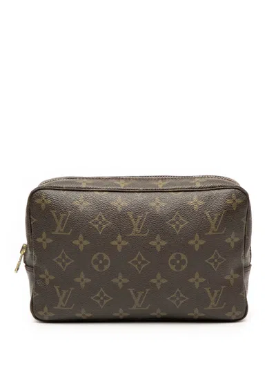 Pre-owned Louis Vuitton 1985 Monogram Trousse Toilette 23 Clutch Bag In Brown