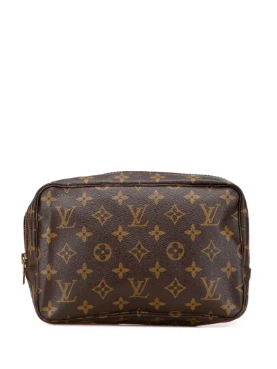 Pre-owned Louis Vuitton 1986 Monogram Trousse Toilette 23 Clutch Bag In Brown