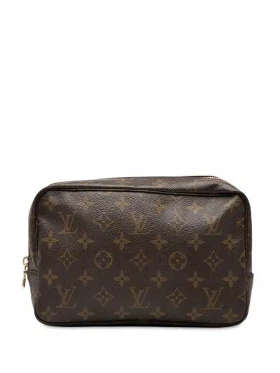 Pre-owned Louis Vuitton 1986 Monogram Trousse Toilette 23 Clutch Bag In Brown