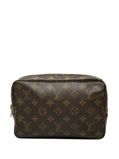 Pre-owned Louis Vuitton 1986 Monogram Trousse Toilette 23 Clutch Bag In Brown