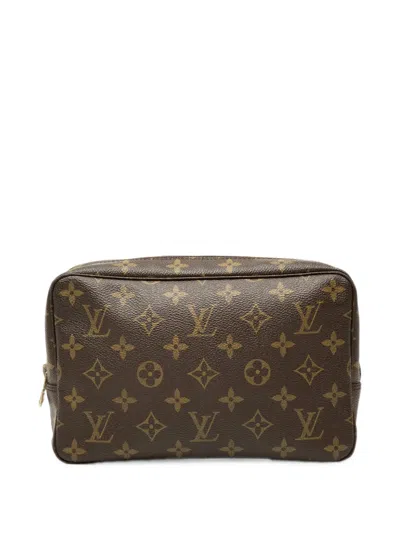 Pre-owned Louis Vuitton 1986 Monogram Trousse Toilette 23 Clutch Bag In Brown