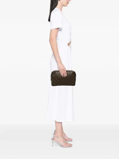 Pre-owned Louis Vuitton 1986 Monogram Trousse Toilette 28 Clutch Bag In Brown