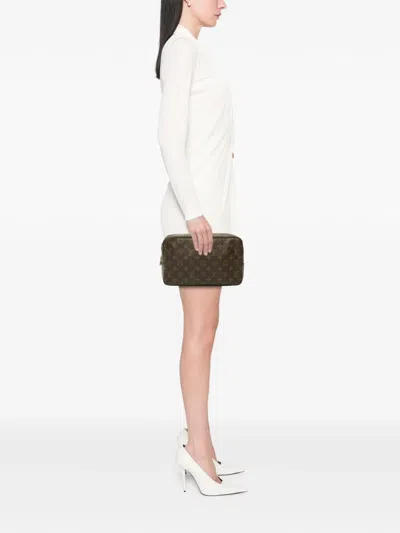 Pre-owned Louis Vuitton 1987 Monogram Trousse Toilette 28 Clutch Bag In Brown