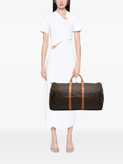 Pre-owned Louis Vuitton 1988 Monogram Keepall 60 Travel Bag In Brown