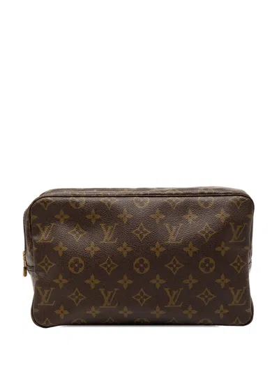Pre-owned Louis Vuitton 1988 Monogram Trousse Toilette 28 Clutch Bag In Brown