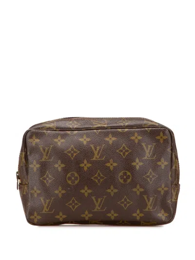 Pre-owned Louis Vuitton 1990-2025 Monogram Trousse Toilette 23 Clutch Bag In Brown