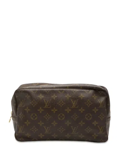 Pre-owned Louis Vuitton 1990-2025 Monogram Trousse Toilette 28 Clutch Bag In Brown