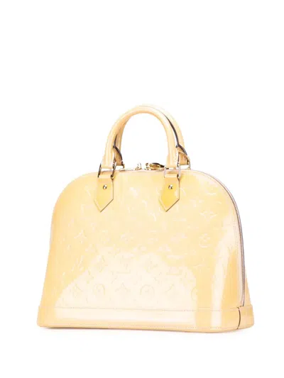 Pre-owned Louis Vuitton 1990-2025 Monogram Vernis Alma Pm Handbag In Yellow