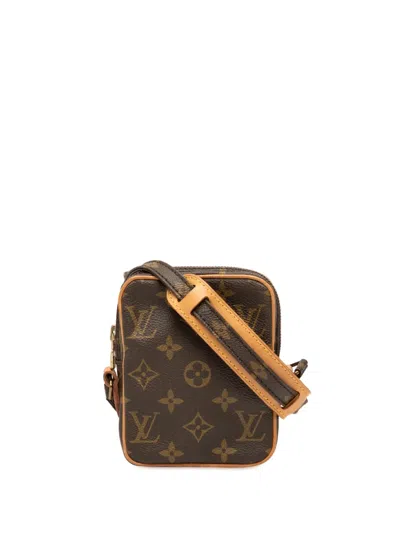Pre-owned Louis Vuitton 1990 Monogram Mini Danube Crossbody Bag In Brown