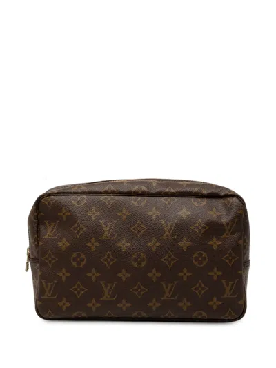 Pre-owned Louis Vuitton 1991 Monogram Trousse Toilette 28 Clutch Bag In Brown