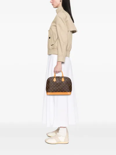 Pre-owned Louis Vuitton 1995 Monogram Alma Pm Handbag In Brown