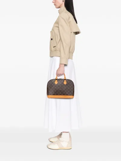 Pre-owned Louis Vuitton 1996 Monogram Alma Pm Handbag In Brown