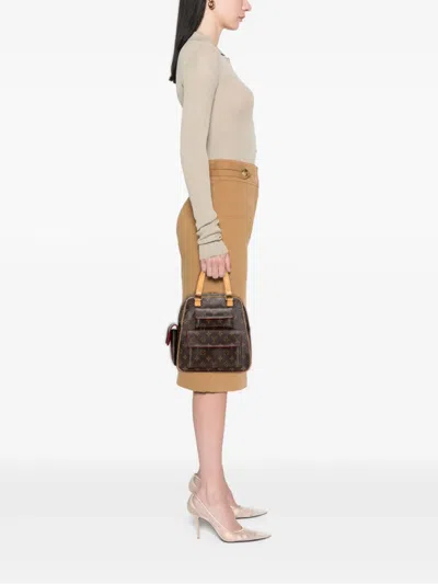 Pre-owned Louis Vuitton 2003 Monogram Excentri-cite Handbag In Brown