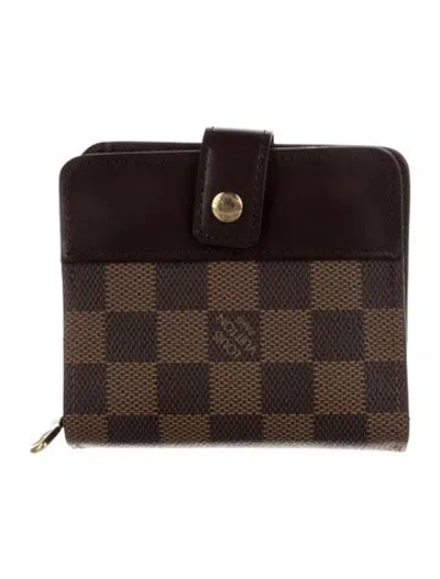 Pre-owned Louis Vuitton 2004 Damier Ebene Pattern Compact Zippé Wallet In Brown
