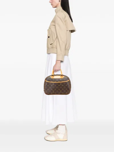 Pre-owned Louis Vuitton 2005 Monogram Trouville Handbag In Brown