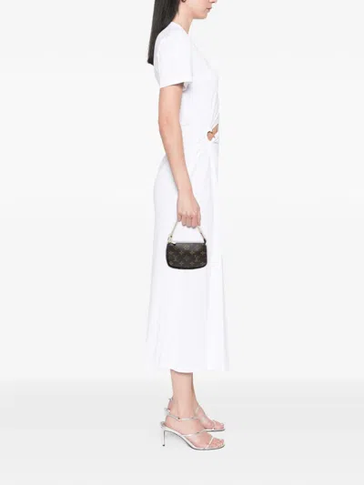 Pre-owned Louis Vuitton 2006 Monogram Mini Pochette Accessoires Handbag In Brown