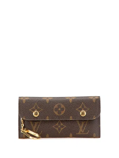 Pre-owned Louis Vuitton 2006 Monogram Multicles Rabat Key Holder In Brown