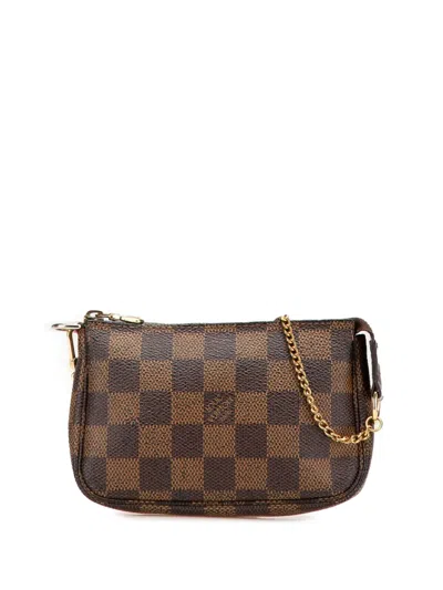 Pre-owned Louis Vuitton 2007 Damier Ebene Mini Pochette Accessoires Handbag In Brown