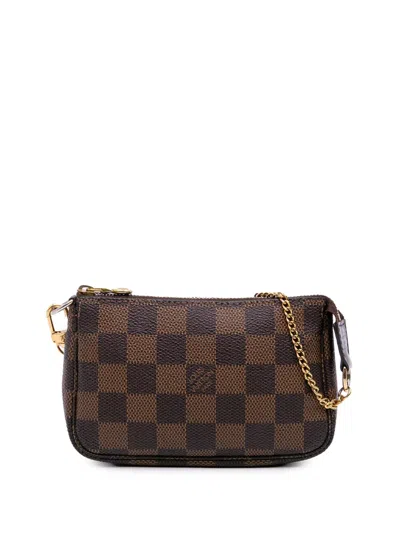 Pre-owned Louis Vuitton 2007 Damier Ebene Mini Pochette Accessoires Handbag In Brown