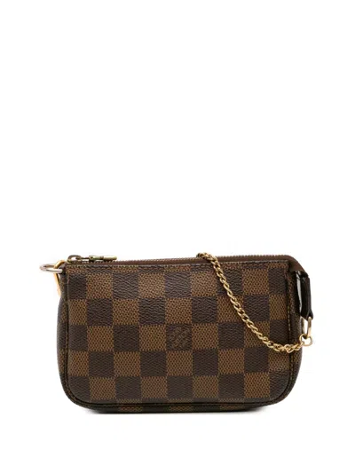 Pre-owned Louis Vuitton 2007 Damier Ebene Mini Pochette Accessoires Handbag In Brown