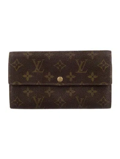 Pre-owned Louis Vuitton 2007 Lv Monogram International Wallet In Brown