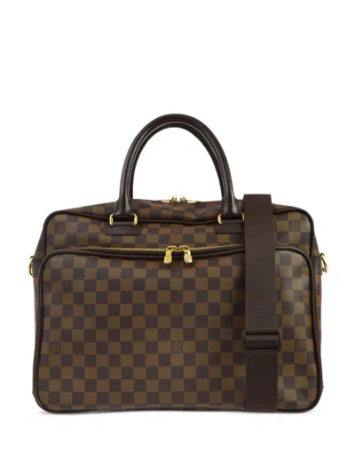 Pre-owned Louis Vuitton 2008 Ikar Handbag In Brown