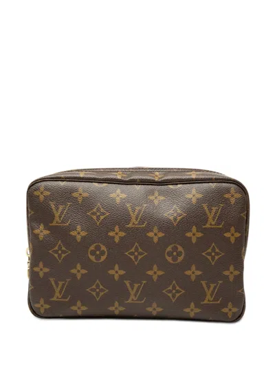 Pre-owned Louis Vuitton 2008 Monogram Trousse Toilette 23 Clutch Bag In Brown
