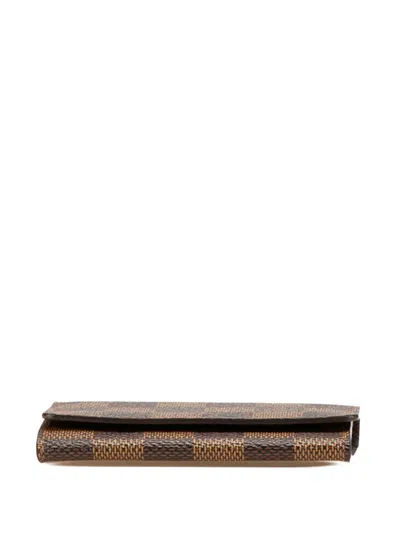 Pre-owned Louis Vuitton 2009 Damier Ebene Business Card Holder In Brown