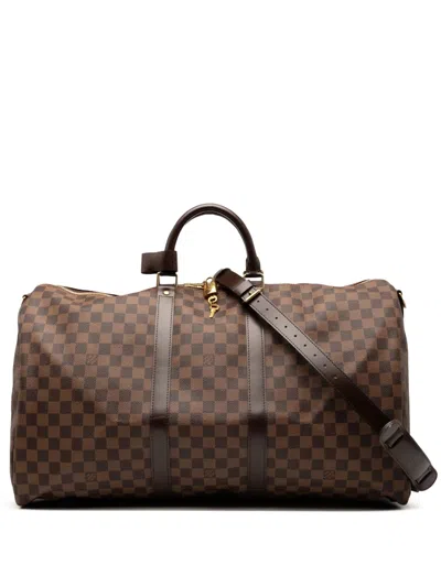 Pre-owned Louis Vuitton 2009 Damier Ebene Keepall Bandouliere 55 Travel Bag In Brown