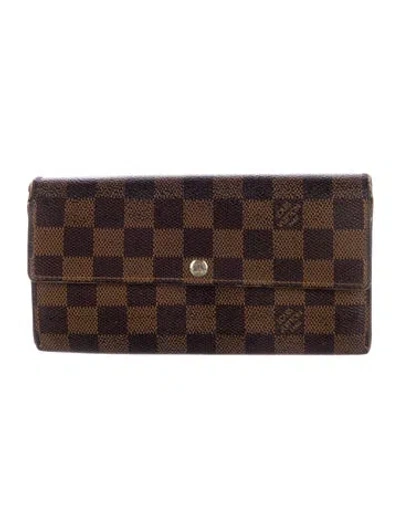 Pre-owned Louis Vuitton 2009 Damier Ebene Pattern Sarah Wallet In Brown